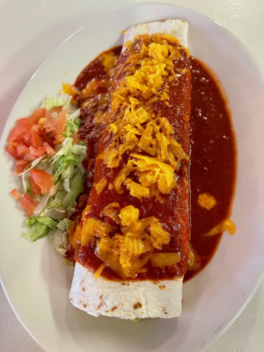 Mary & Tito’s Cafe signature dishes Carne Adovada Stuffed Sopaipillas, Red Chile Enchiladas, Chiles Rellenos, Turnovers